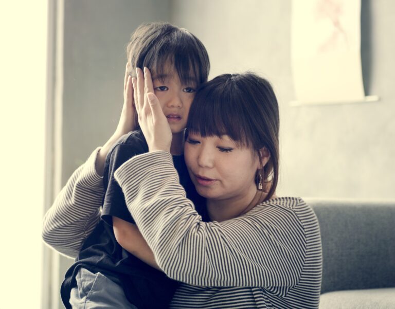 Japanese mother comforting her daughter