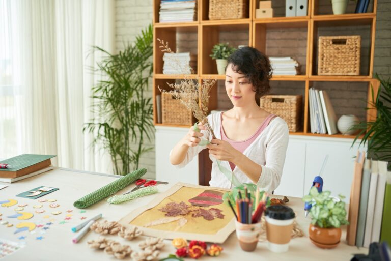 Woman Doing Artwork in Japanese Art Style